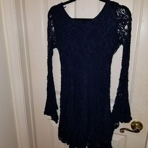 Backless navy lace mini with bell sleeves